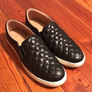 A new day black stitched sneaker